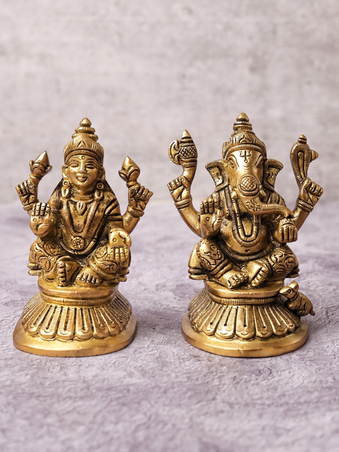 

The Advitya Gold Toned Ganesha With Laxmi On High Base Brass Religious Idol Showpiece