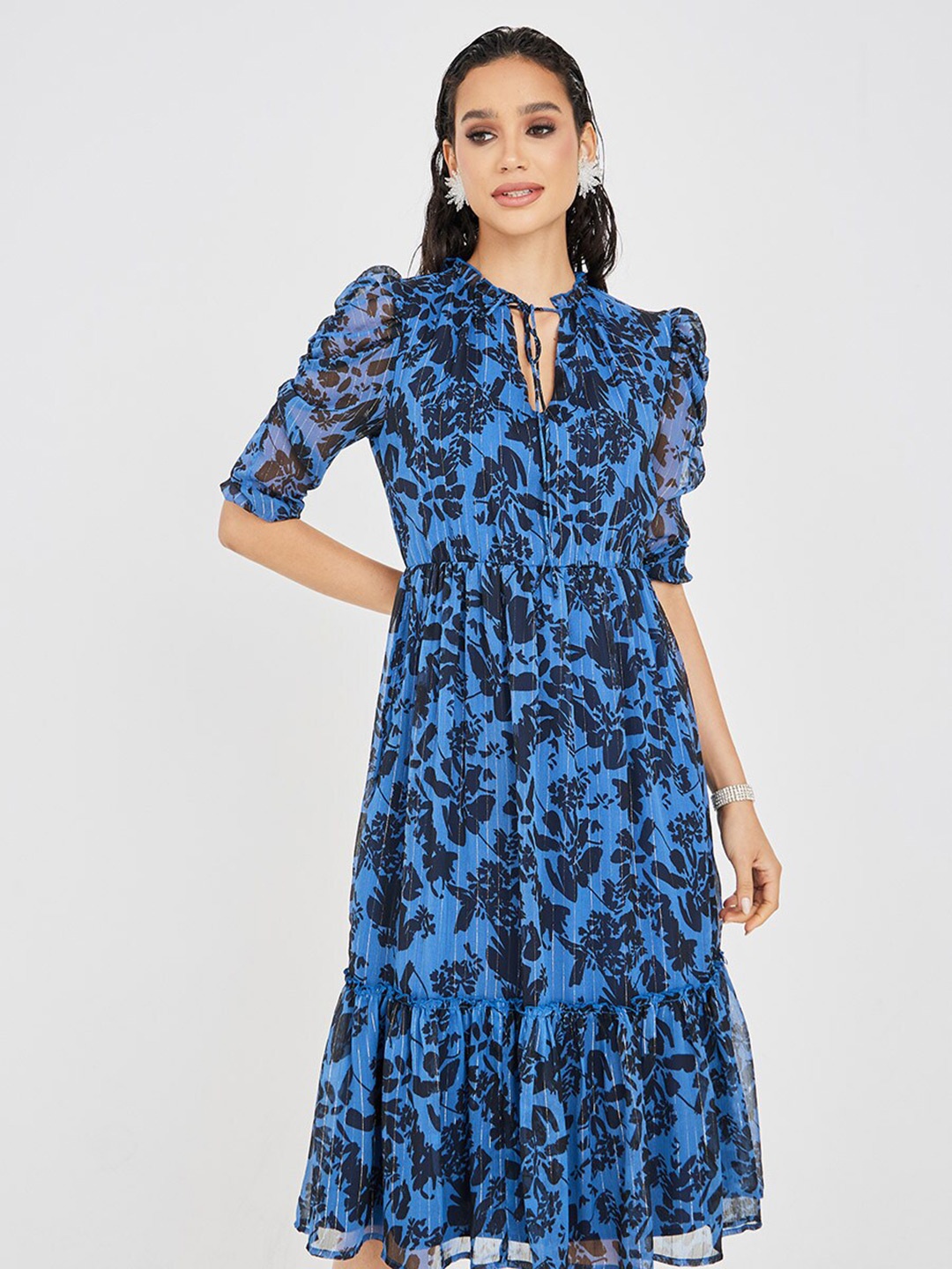 

Styli Floral Printed Puff Sleeves Tie-Up Neck Smocked & Tiered Fit and Flare Midi Dress, Navy blue