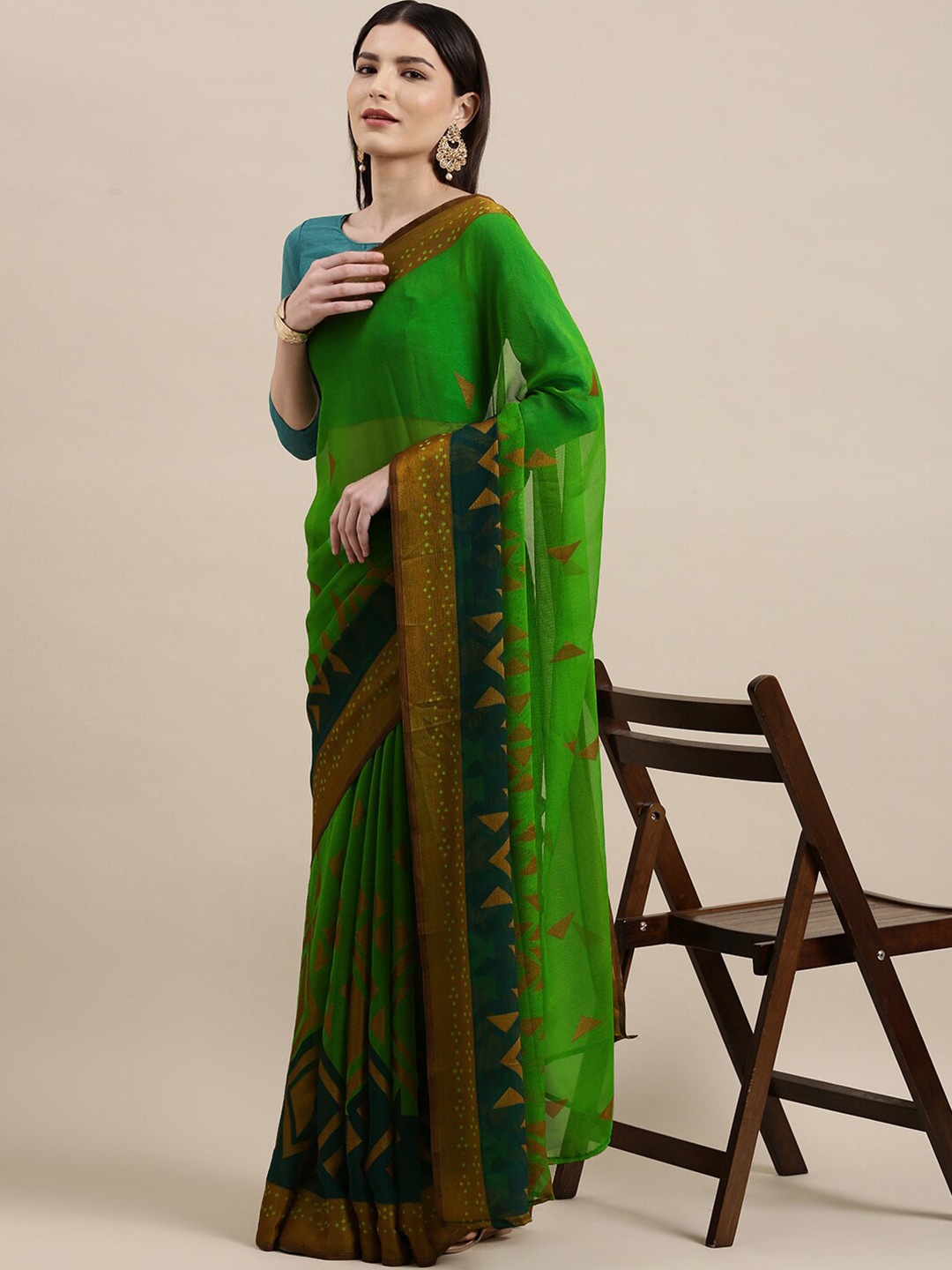 

KALINI Green Ethnic Motifs Poly Chiffon Saree