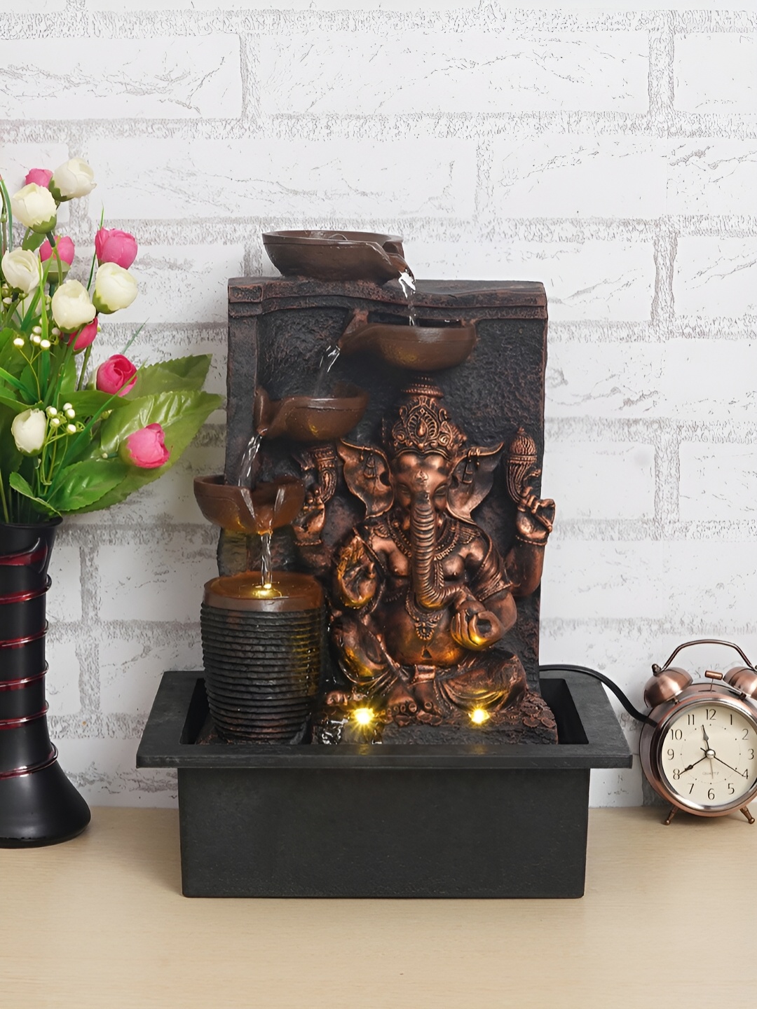 

CHRONIKLE Brown & Black Lord Ganesh Idol 4-Step Diya Water Fountain With LED Light