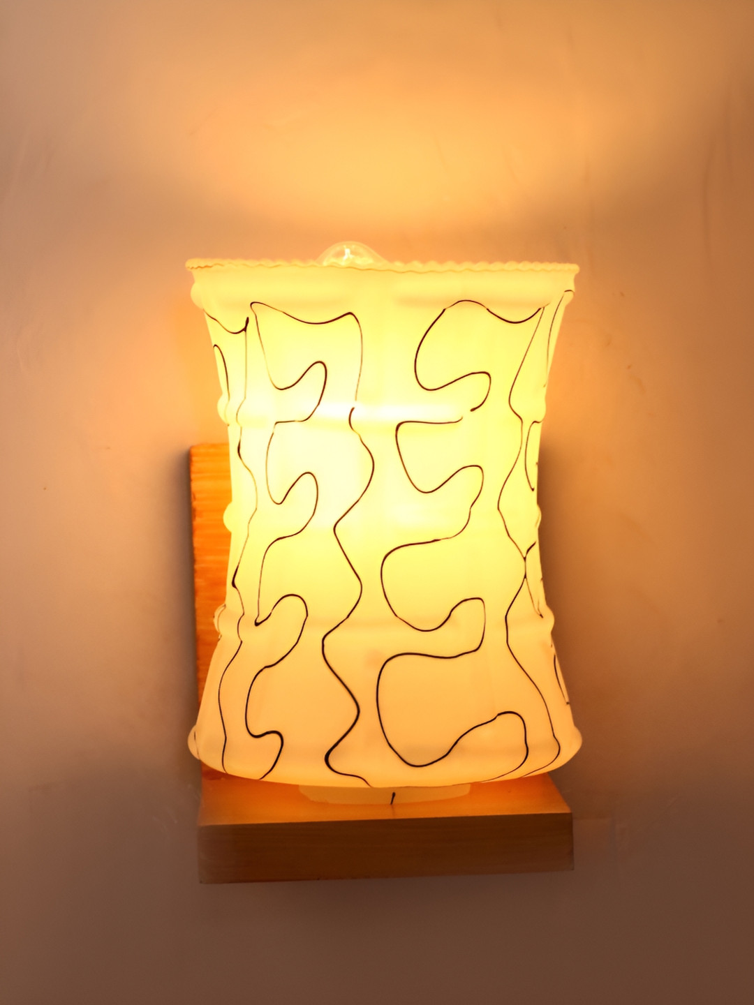 

Afast Beige Cylinder Shaped Glass Wall Lamp