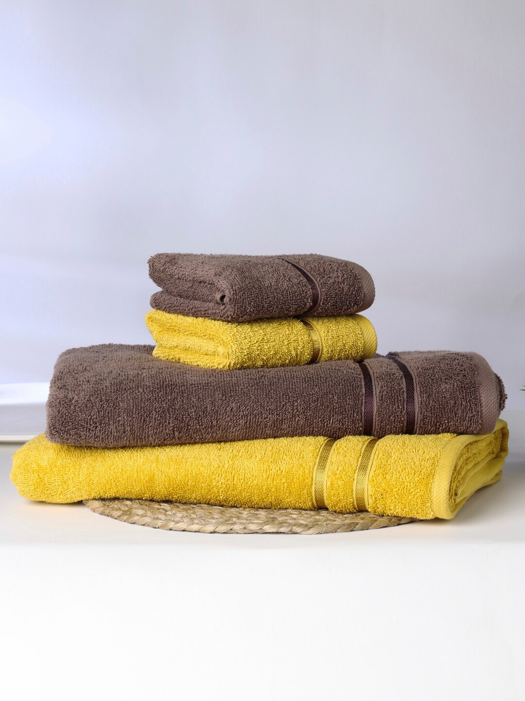 

SPACES Edira Yellow & Brown 4 Pieces Self Design Pure Cotton 400 GSM Towel Set