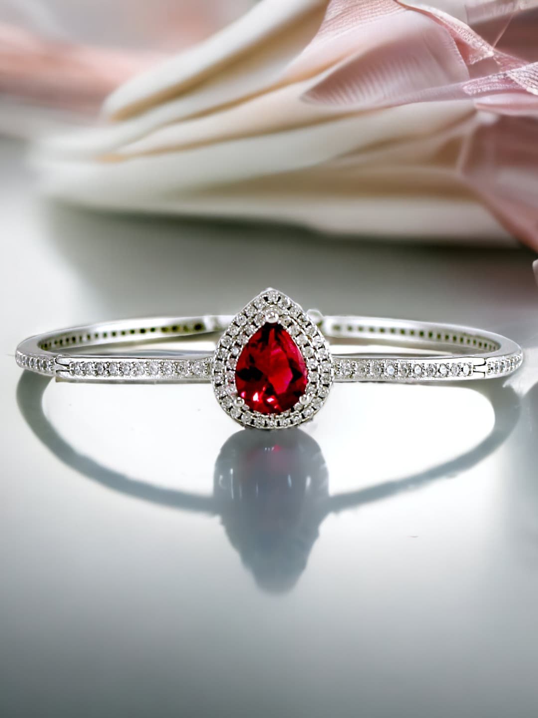 

Taraash 925 Sterling Silver CZ Studded Pear Drop Bangle