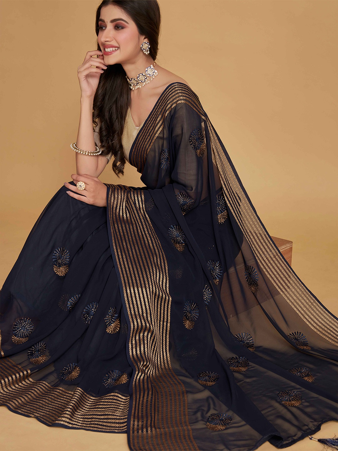 

Sangria Black Ethnic Motifs Embroidered Zari Pure Georgette Saree