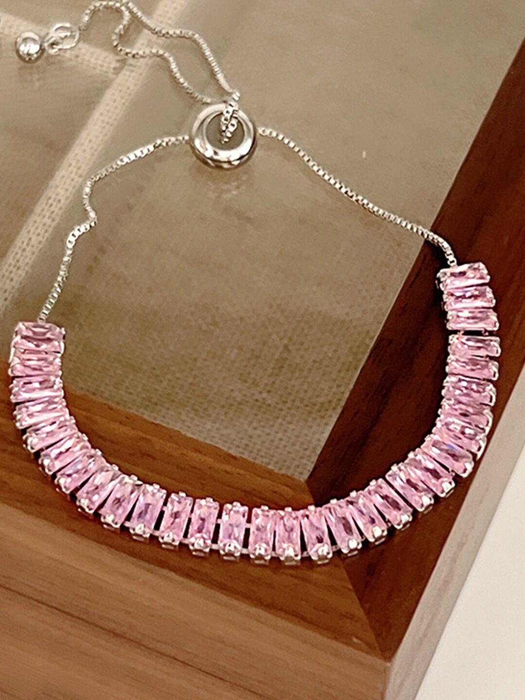 

Designs & You Silver Plated Rectangular Cut Cubic Zirconia Matrix Tennis Bracelet
