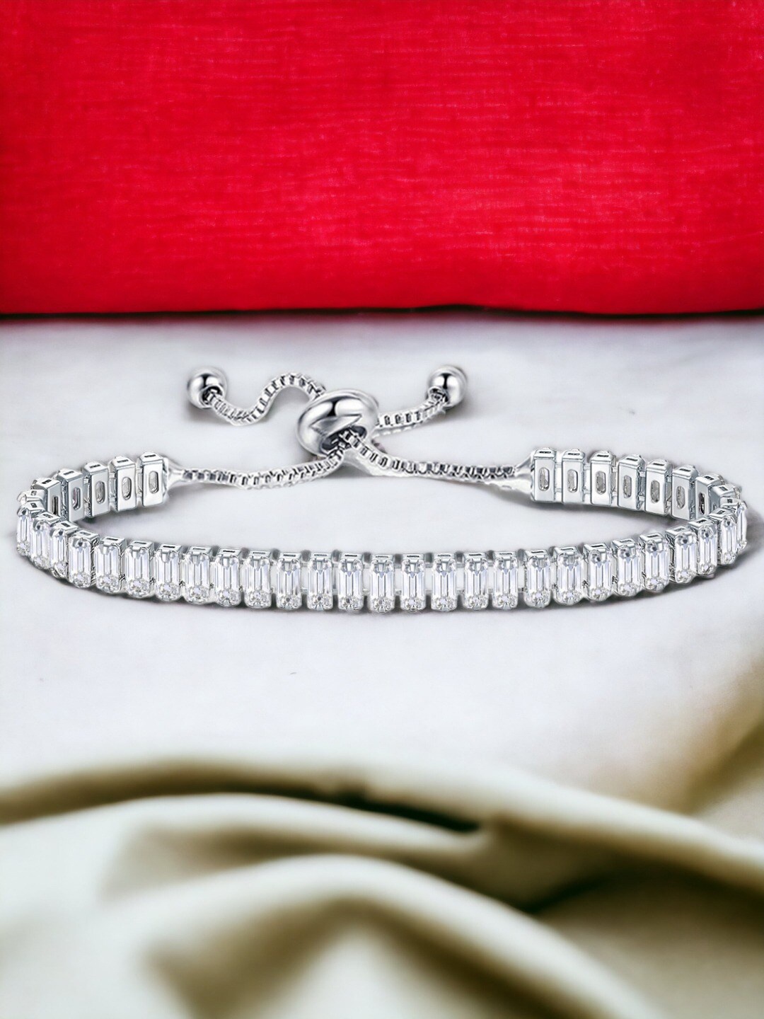

Designs & You Silver Plated Rectangular Cut Cubic Zirconia Matrix Tennis Bracelet