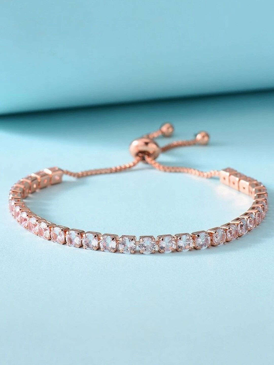 

Designs & You Rose Gold Plated Round Cut Cubic Zirconia White Matrix Tennis Bracelet