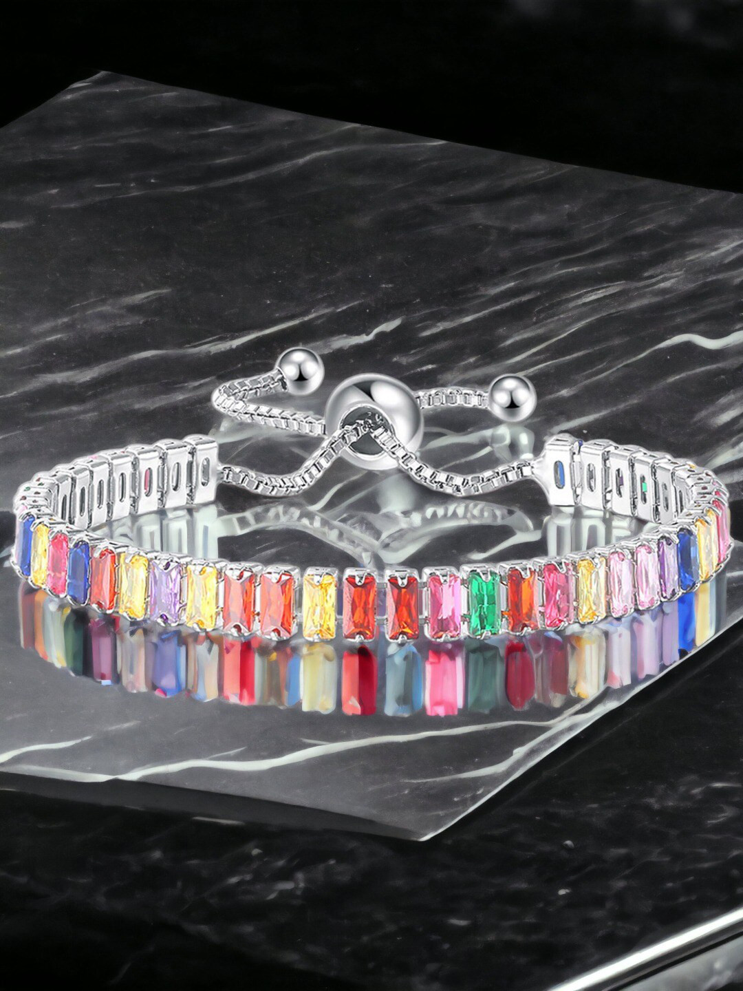 

Designs & You Silver Plated Rectangular Cut Cubic Zirconia Matrix Tennis Bracelet