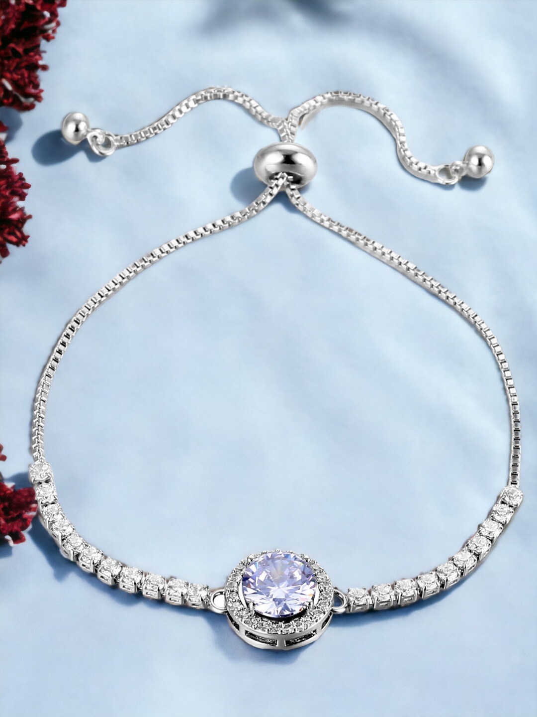 

Designs & You Silver Plated Round Crystal Studded Matrix Tennis Bracelet