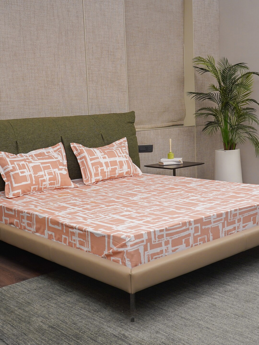 

URBAN SPACE Peach-Coloured Printed Cotton 200 TC Queen Bedsheet With 2 Pillow Covers