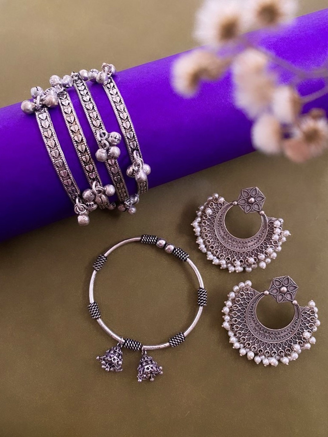 

ATIBELLE Silver-Plated Floral Textured Ghunghroo Jewellery Set