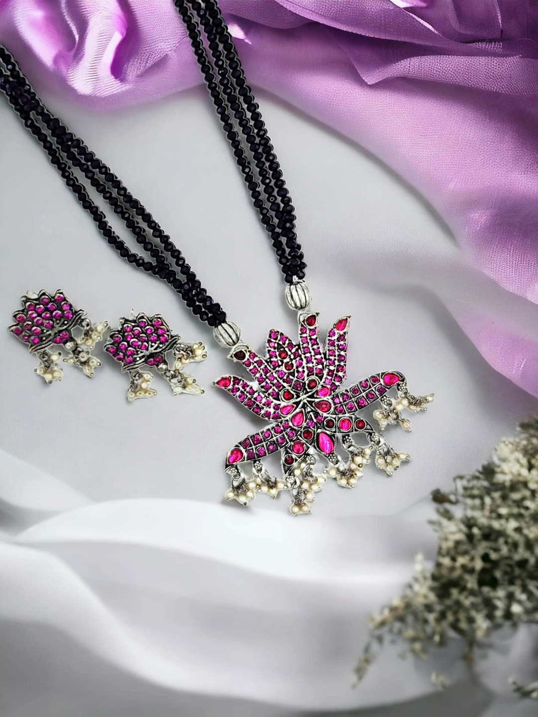 

Sangria Silver-Plated Kundan Studded Jewellery Set