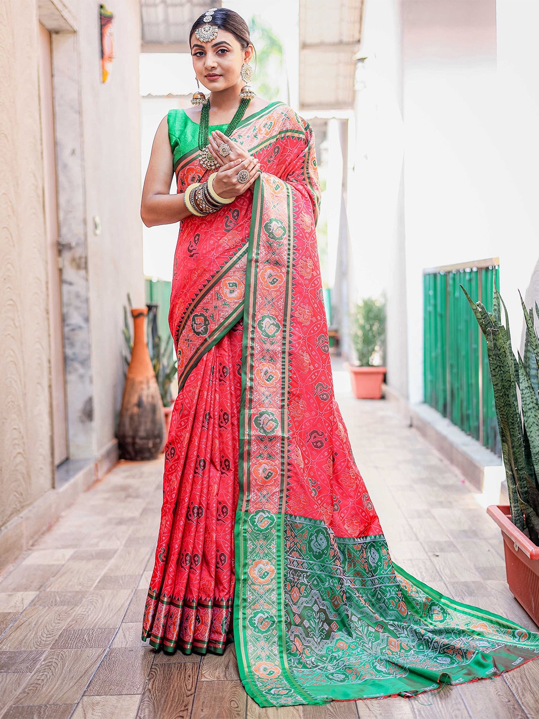 

Mitera Ethnic Motifs Woven Design Zari Patola Saree, Pink