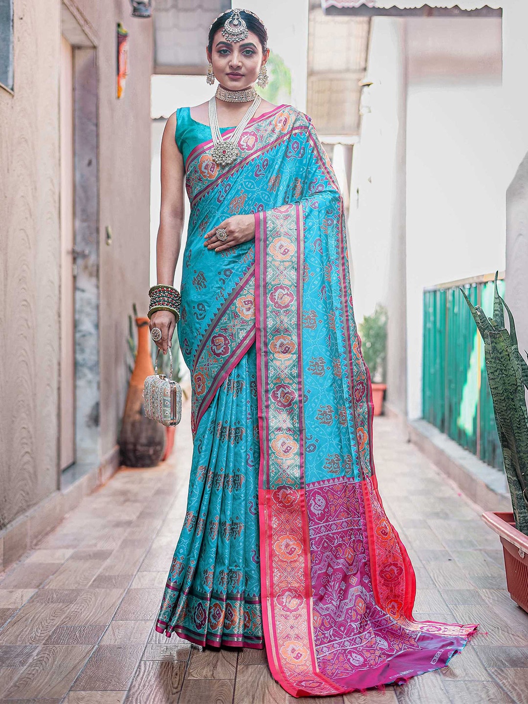 

Mitera Ethnic Motifs Woven Design Zari Patola Saree, Blue