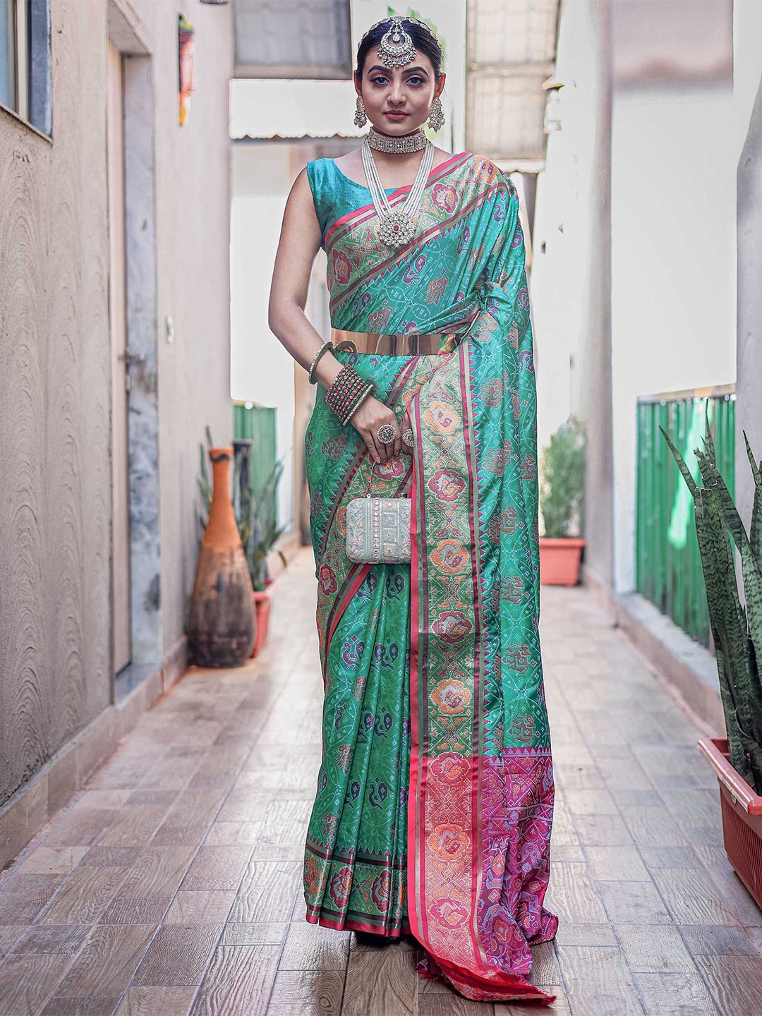 

Mitera Ethnic Motifs Woven Design Zari Patola Saree, Teal