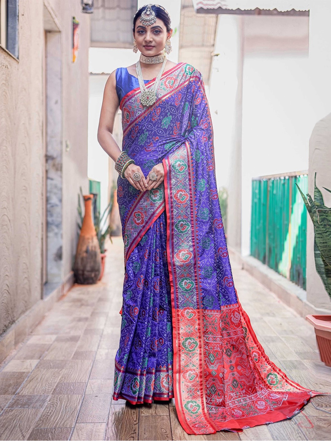 

Mitera Ethnic Motifs Woven Design Zari Patola Saree, Blue