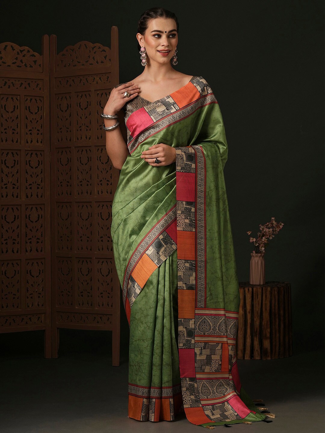 

Anouk Green Ethnic Motifs Silk Blend Designer Dabu Saree