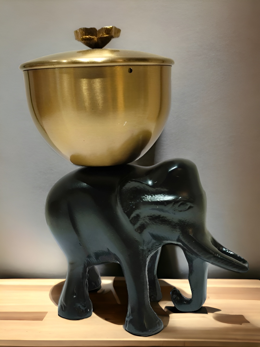 

The Artage Black Elephant Bowl Showpiece