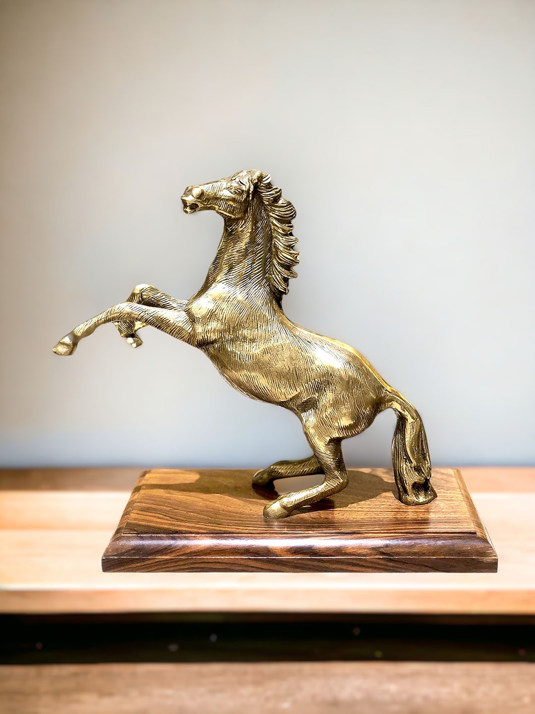 

The Artage Gold-Toned Horse Figurine Showpiece