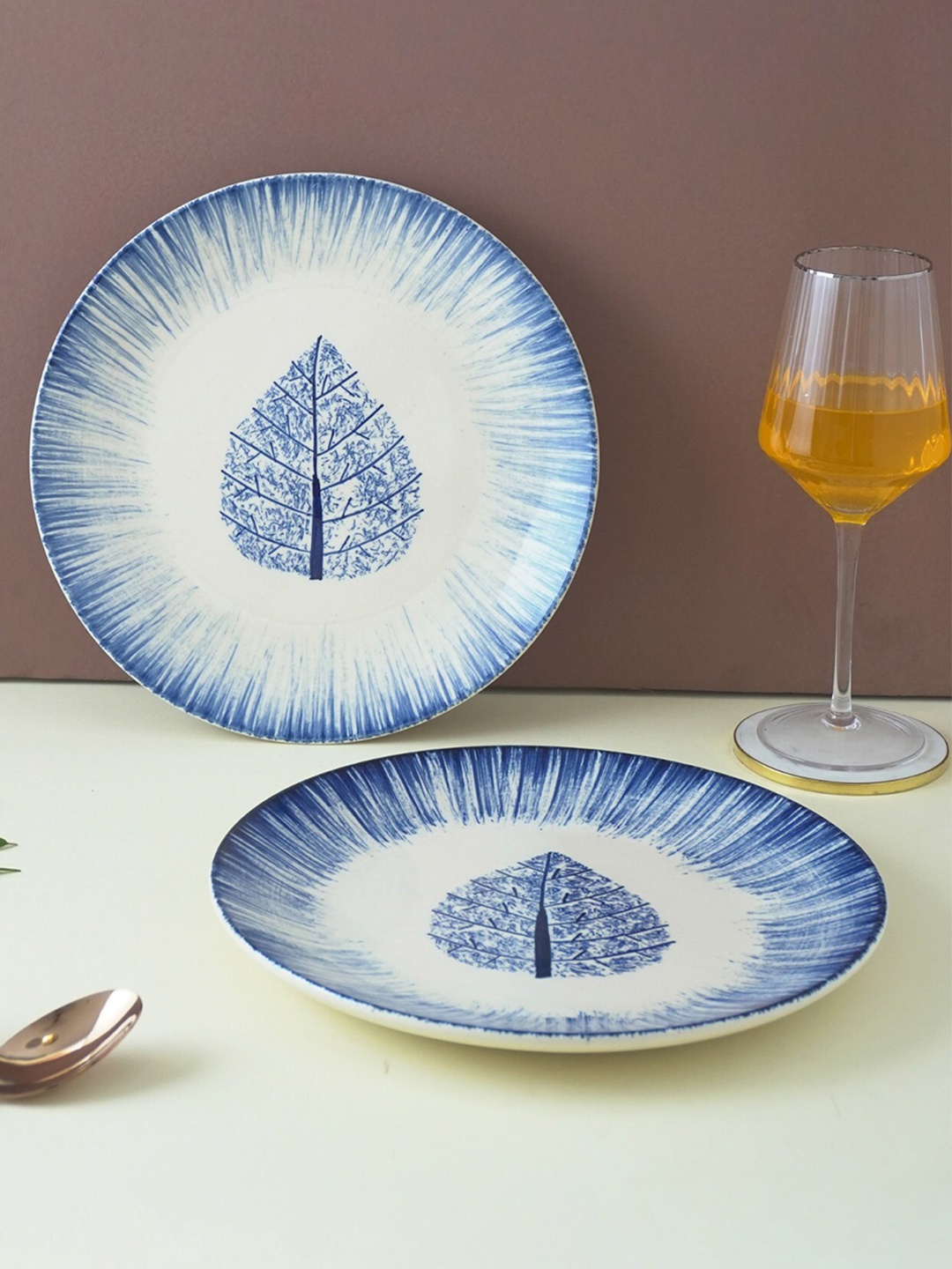 

The Decor Mart Blue & White 2 Pieces Printed Ceramic Matte Plates