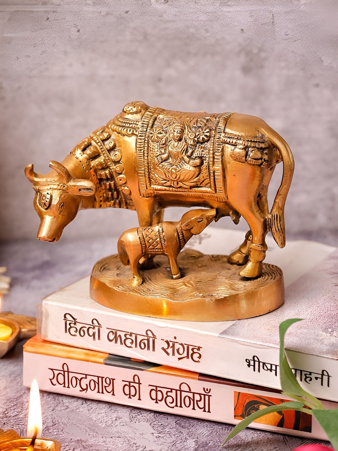 

The Advitya Gold Toned Brass Cow With Calf Superfine Medium Showpiece