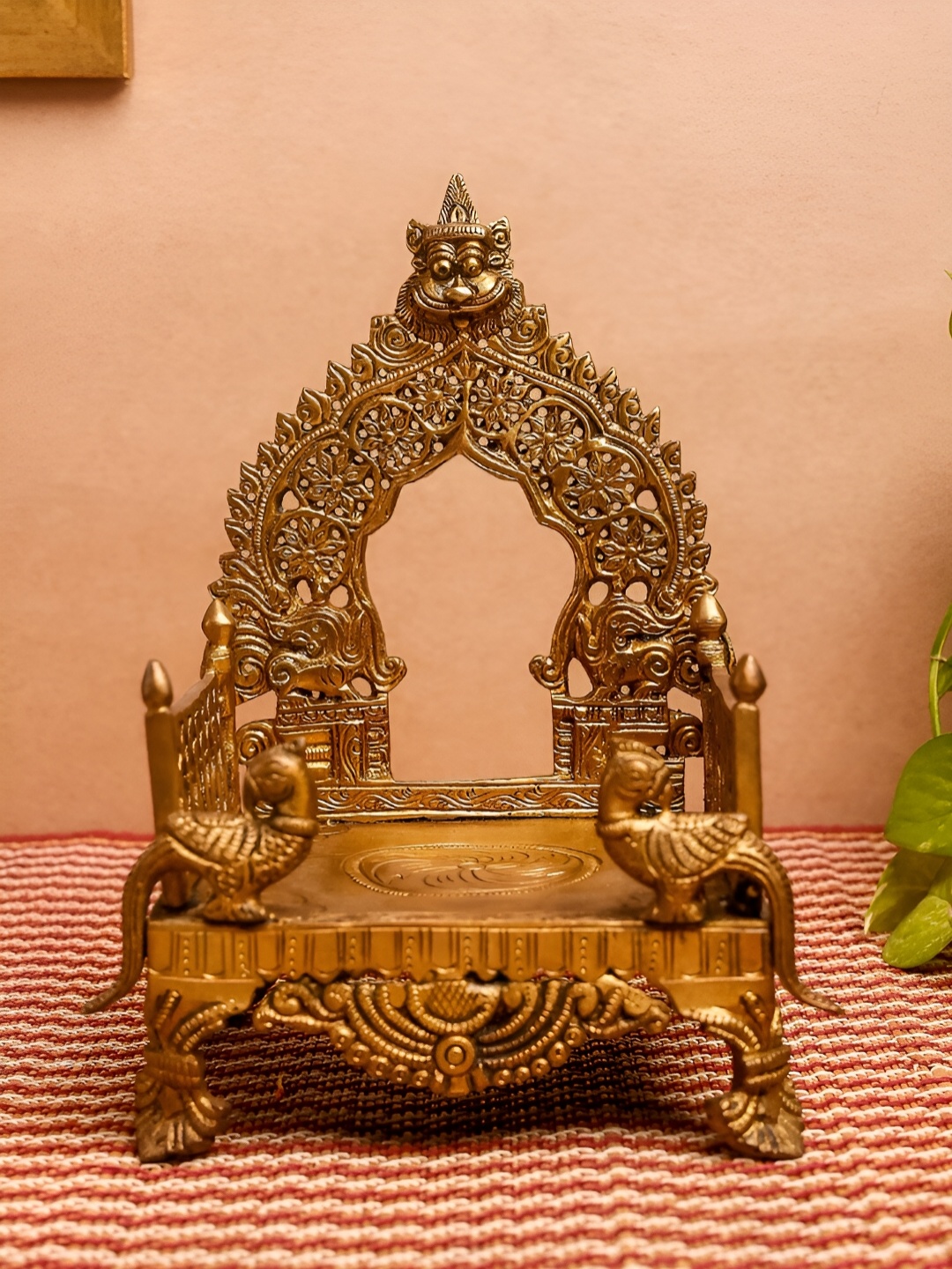 

The Advitya Gold Toned Yali Singhasan Pooja Essential