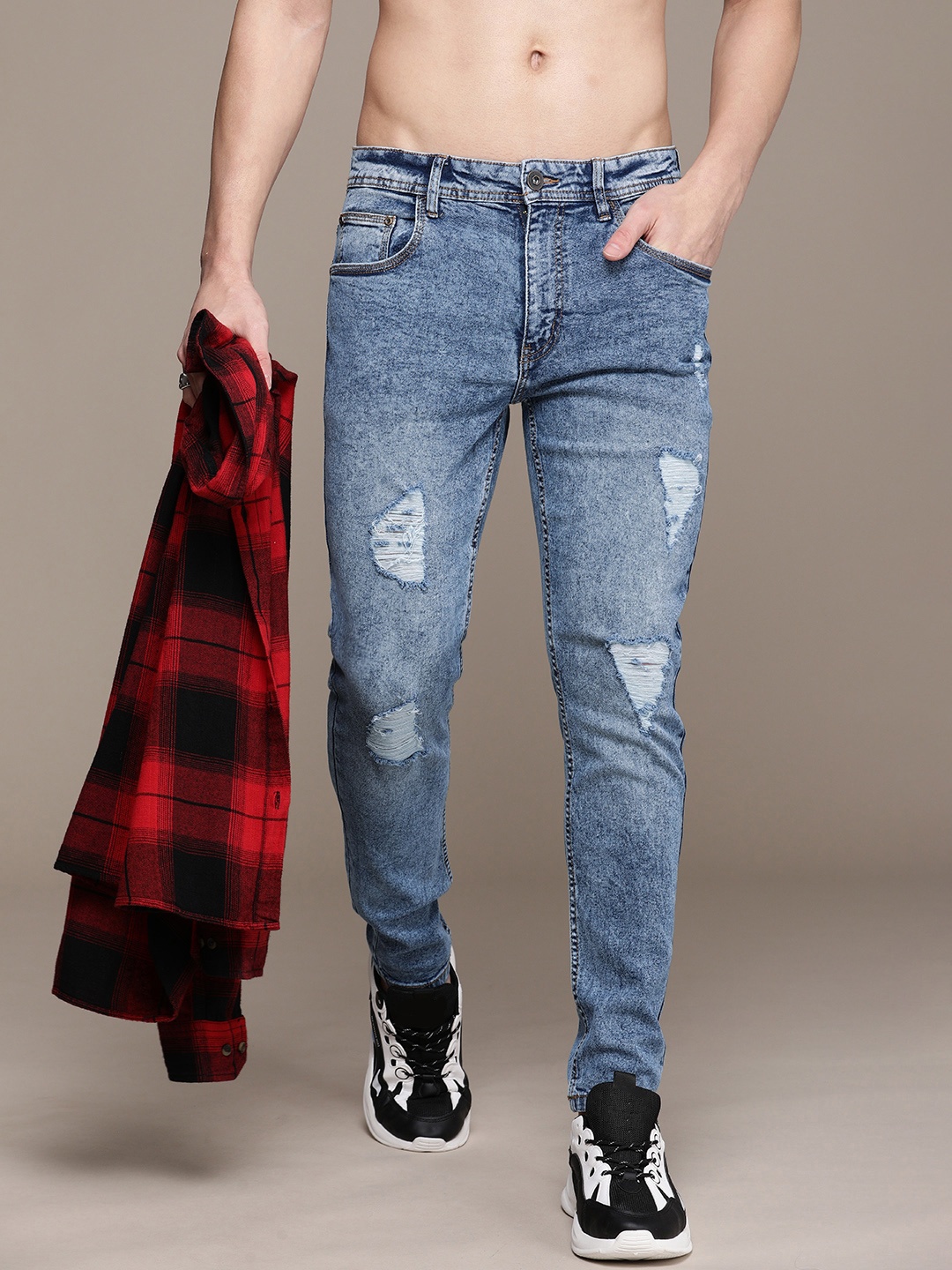 

Roadster Men Tapered Fit Mildly Distressed Light Fade Jeans, Blue