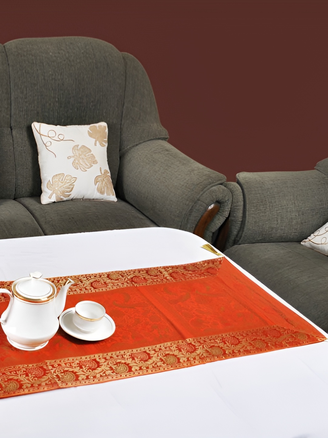 

Lal Haveli Orange & Gold Toned Peacock & Elephant Designed Rectangular Table Runner