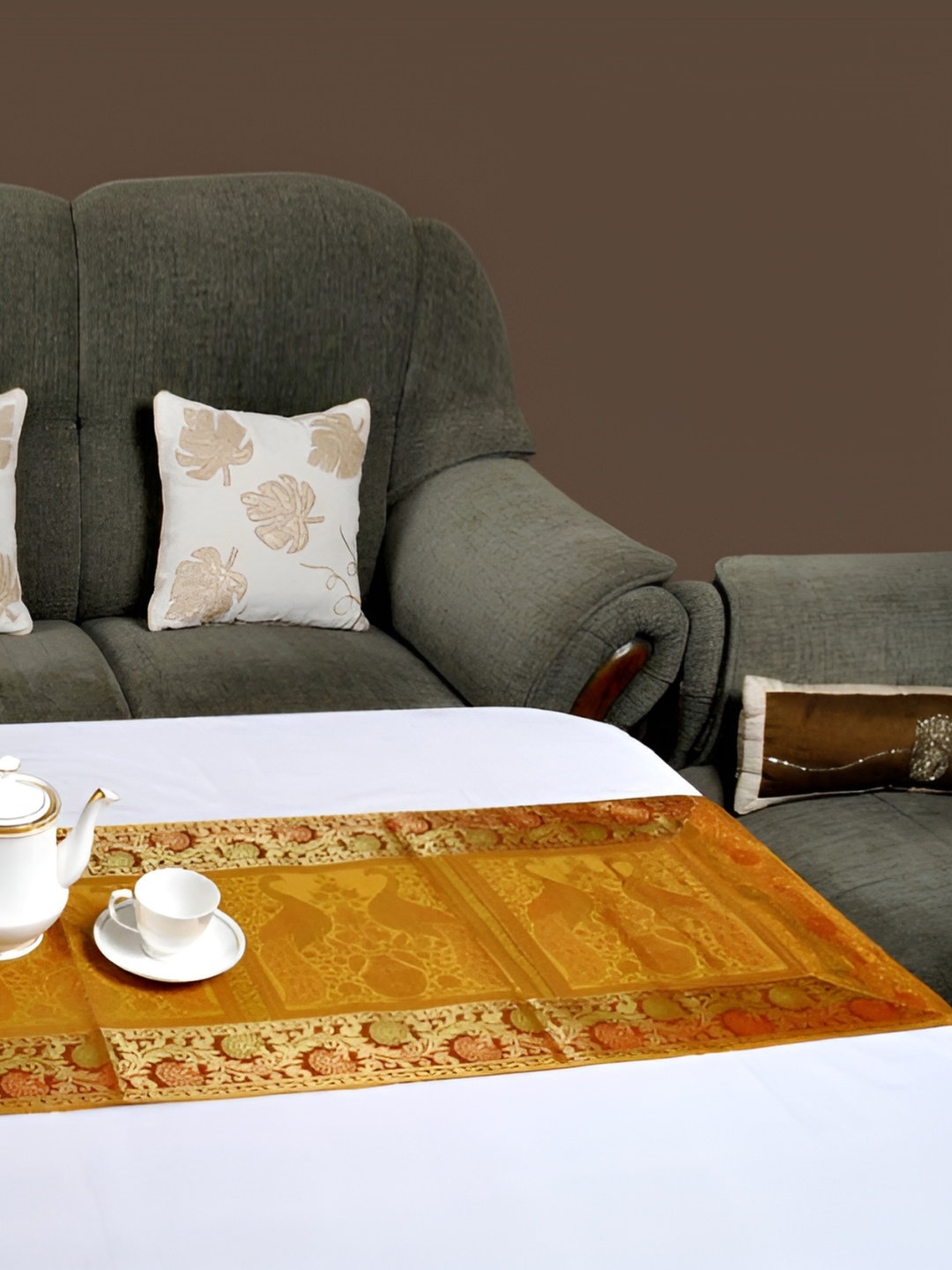 

Lal Haveli Gold Toned Peacock Designed Rectangular Table Runner
