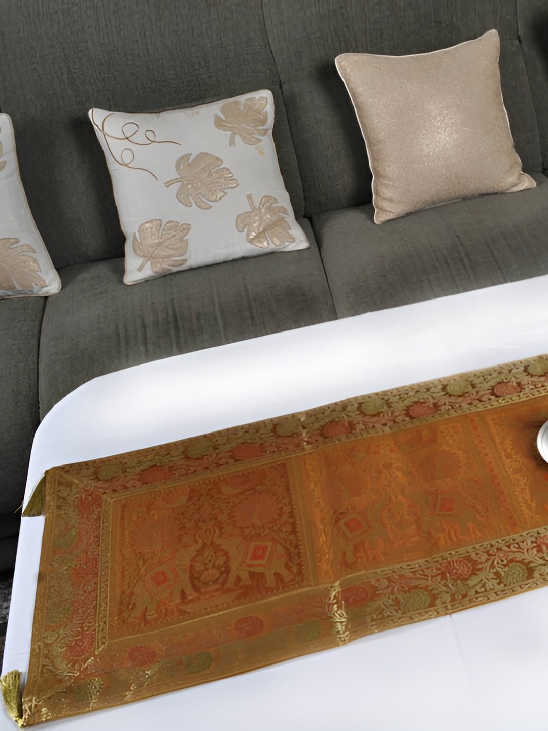 

Lal Haveli Gold Toned & Mustard Elephant Designed Rectangular Table Runner