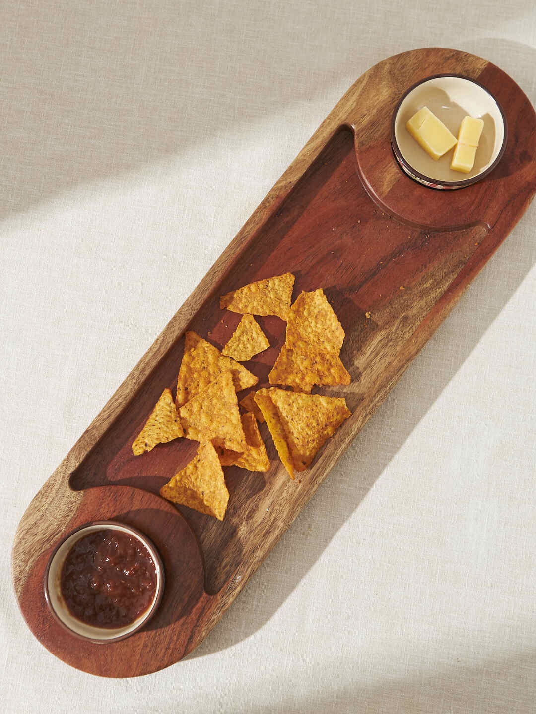 

Chumbak Capsule Chip Brown Wooden Dip Platter