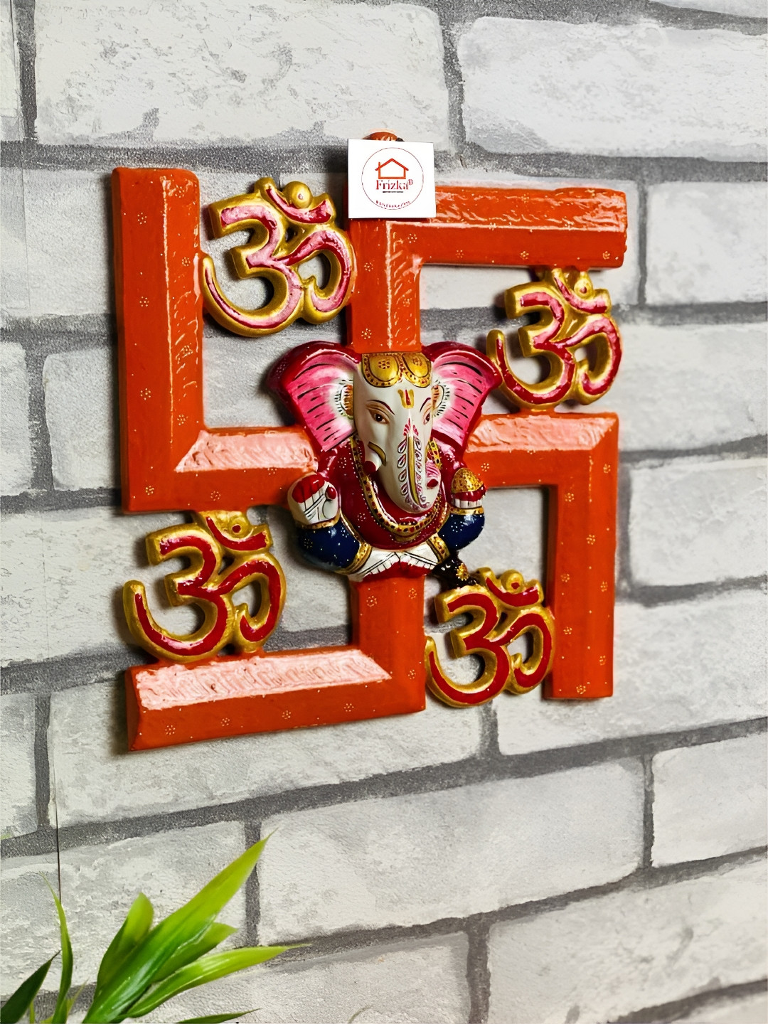 

Frizka Orange Hand painted Metallic Ganesh on Swastik Wall Decor