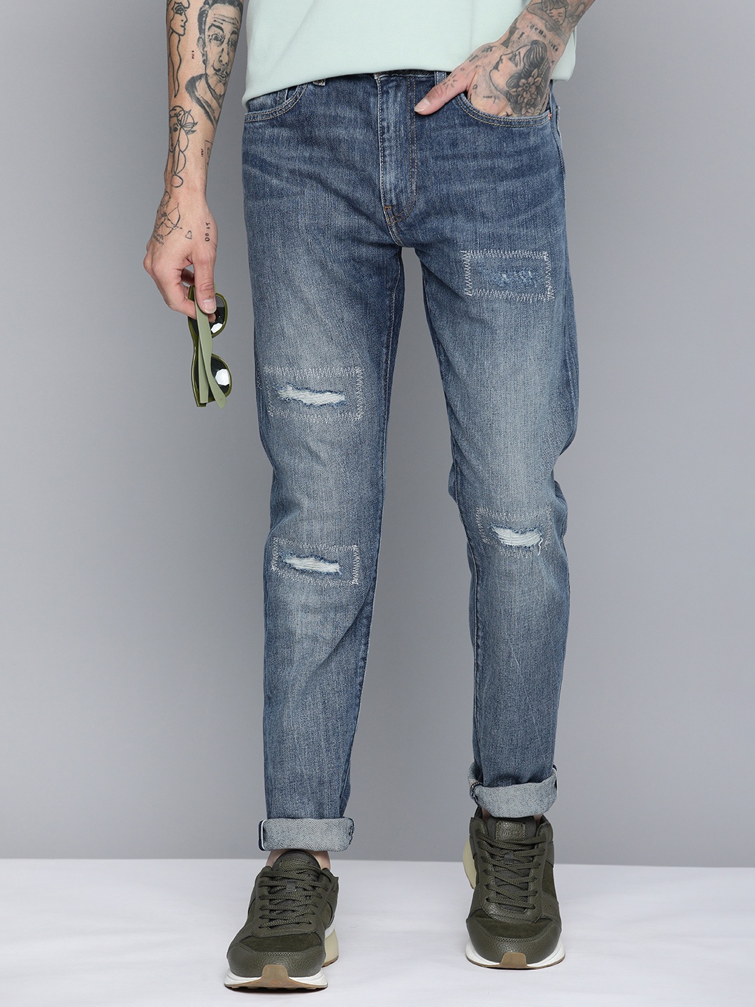 

Levis Men 512 Tapered Fit Mildly Distressed Heavy Fade Stretchable Jeans, Blue