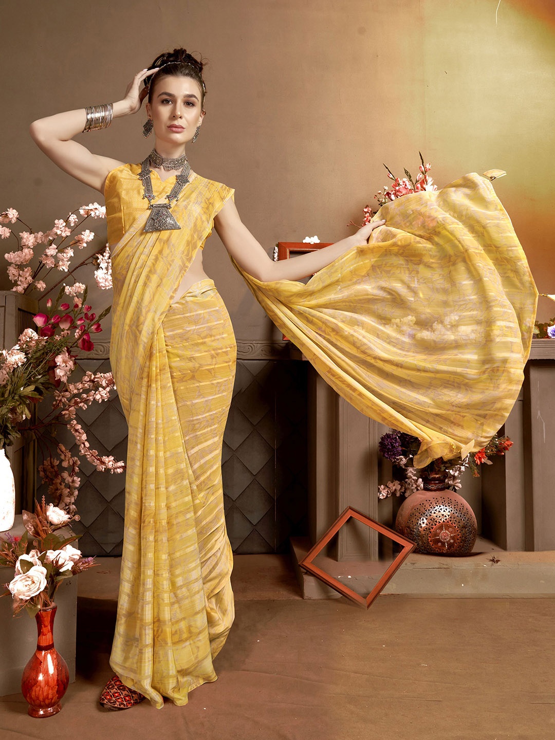

KALINI Yellow Pure Georgette Designer Saree
