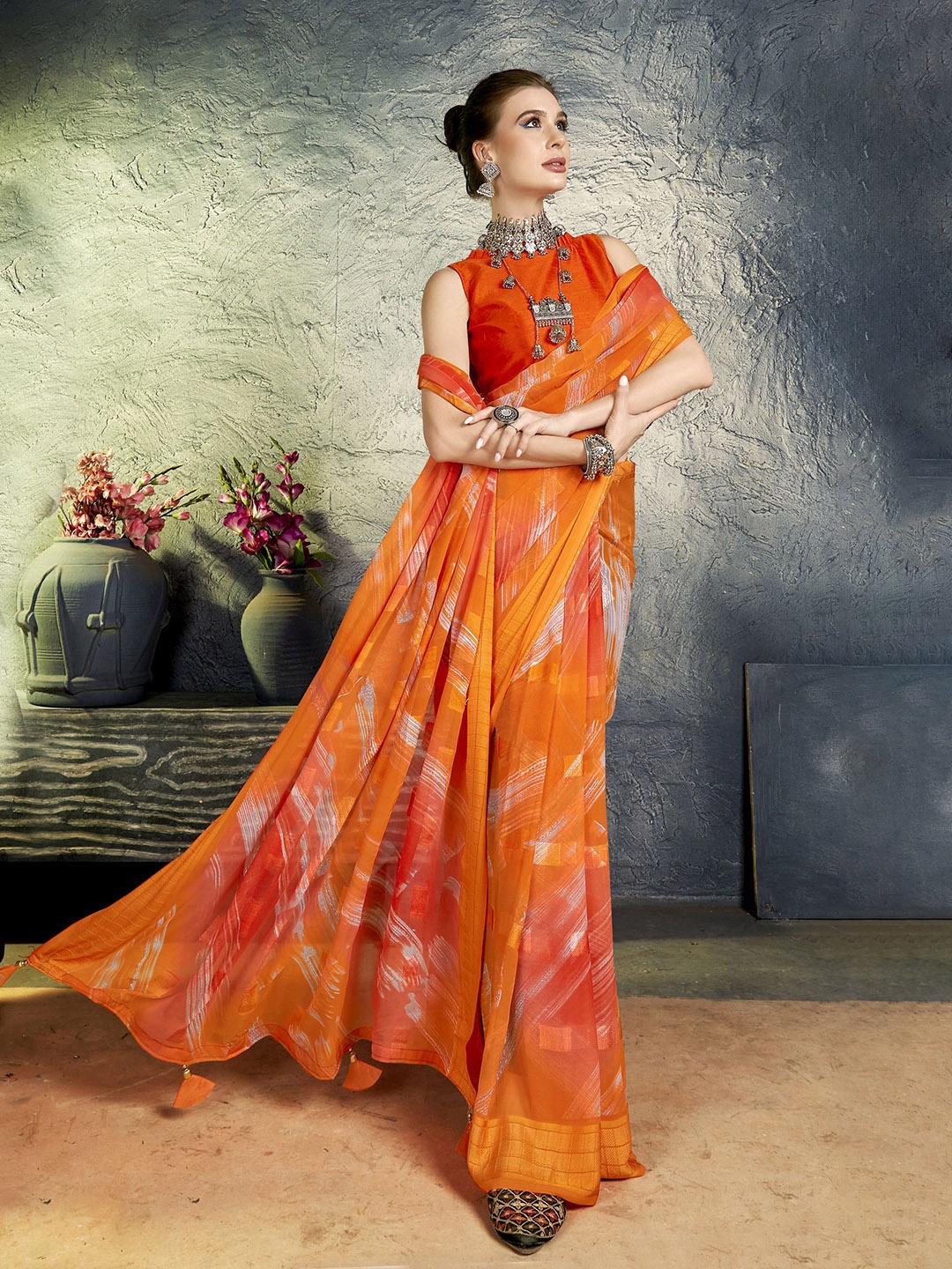 

KALINI Orange Woven Design Pure Georgette Designer Saree