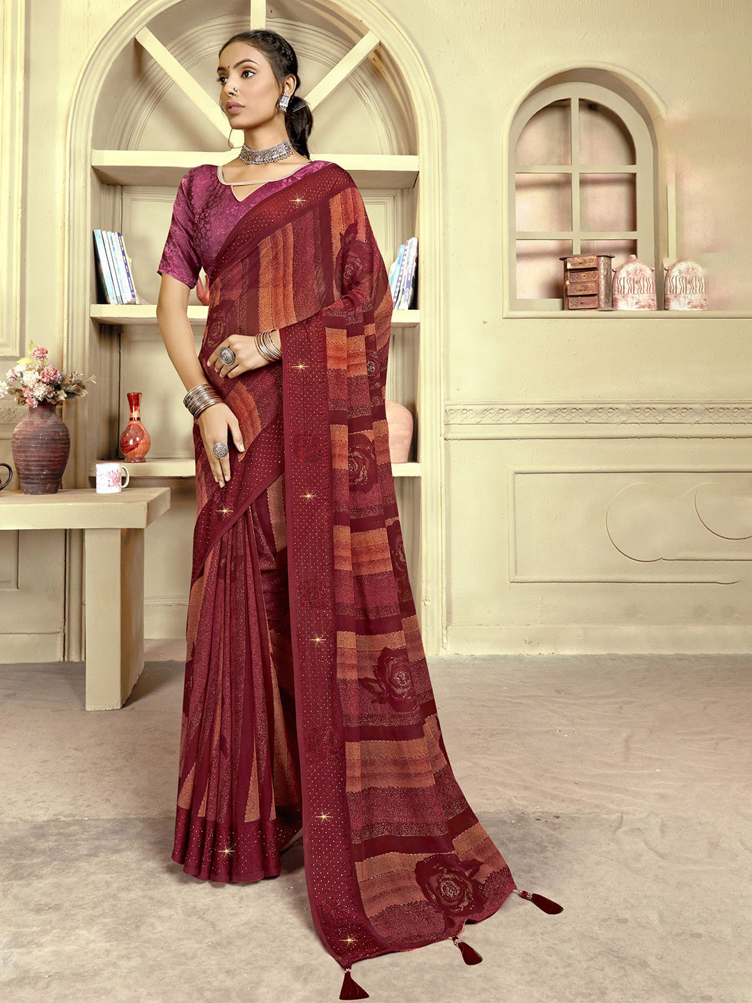 

KALINI Maroon Embellished Pure Georgette Designer Saree