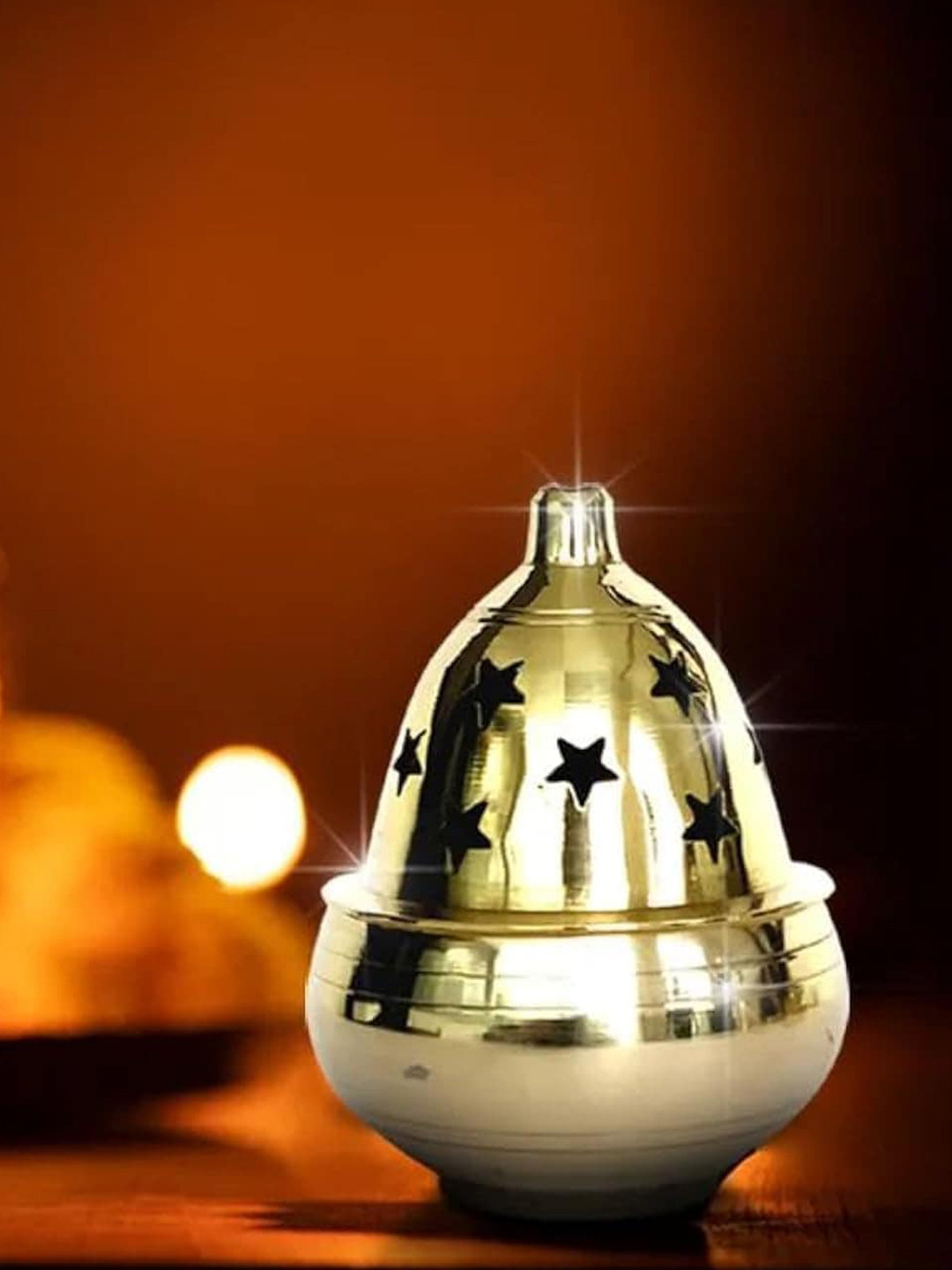 

PujaNPujari Gold Toned Textured Brass Akhand Diya With Cover