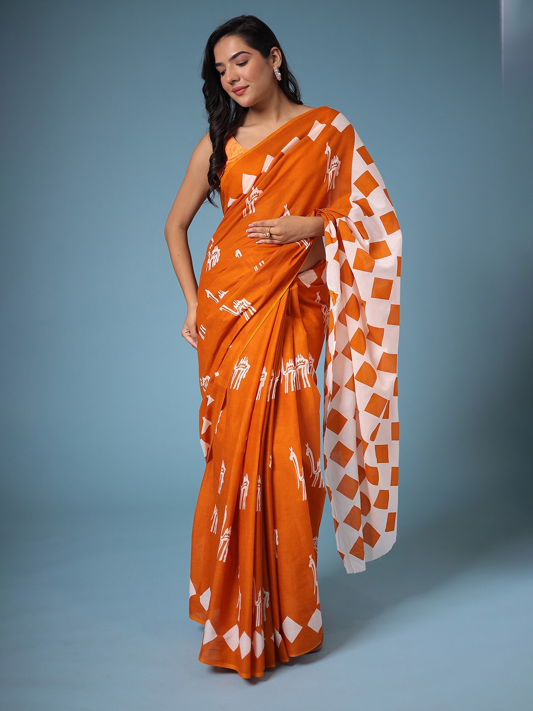 

ZARI Orange & White Ethnic Motifs Printed Bagru Saree