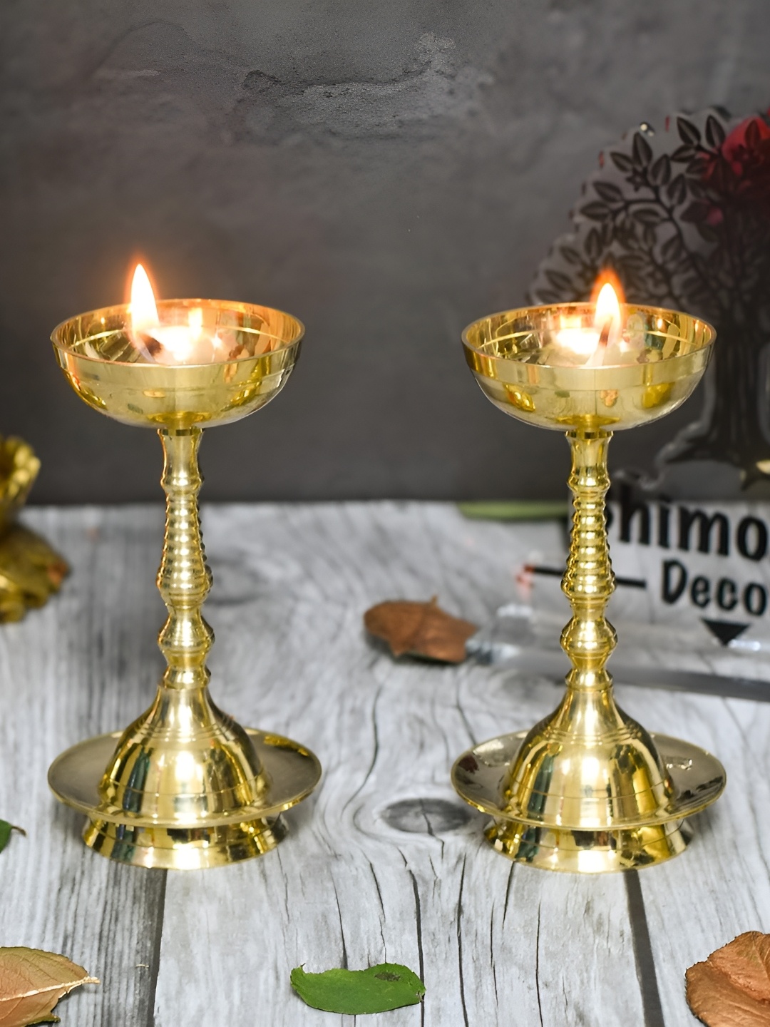 

Bhimonee Decor Gold Toned 2 Pieces Pure Brass Plain Nanda Bowl Long Table Diya