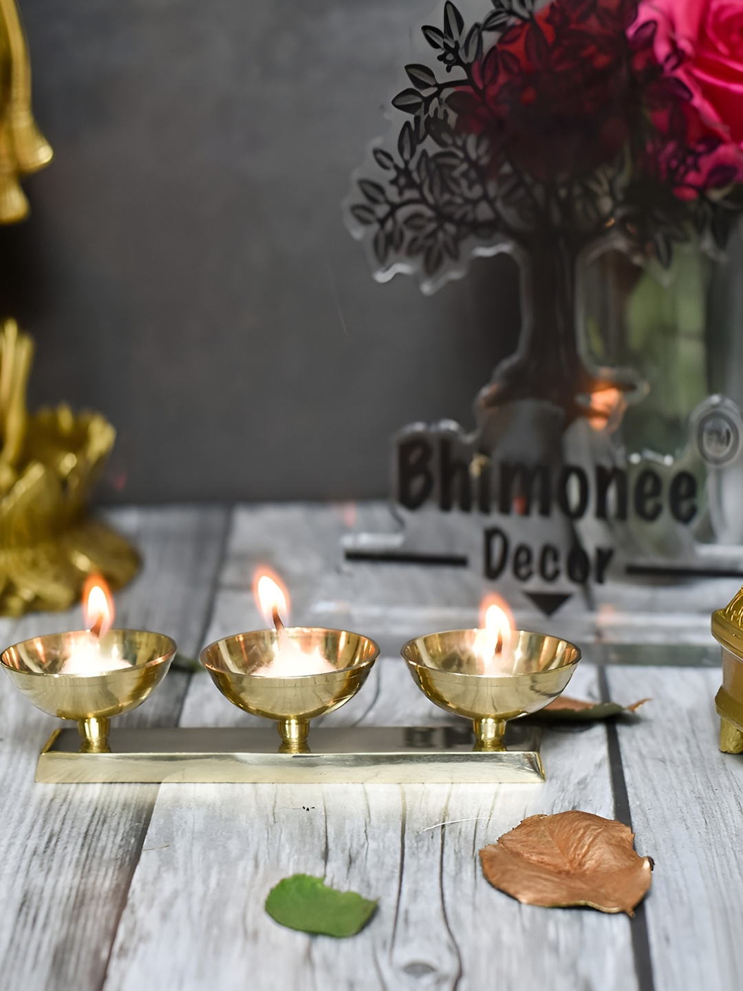 

Bhimonee Decor Gold Toned 1 Piece Pure Brass Cluster Diya