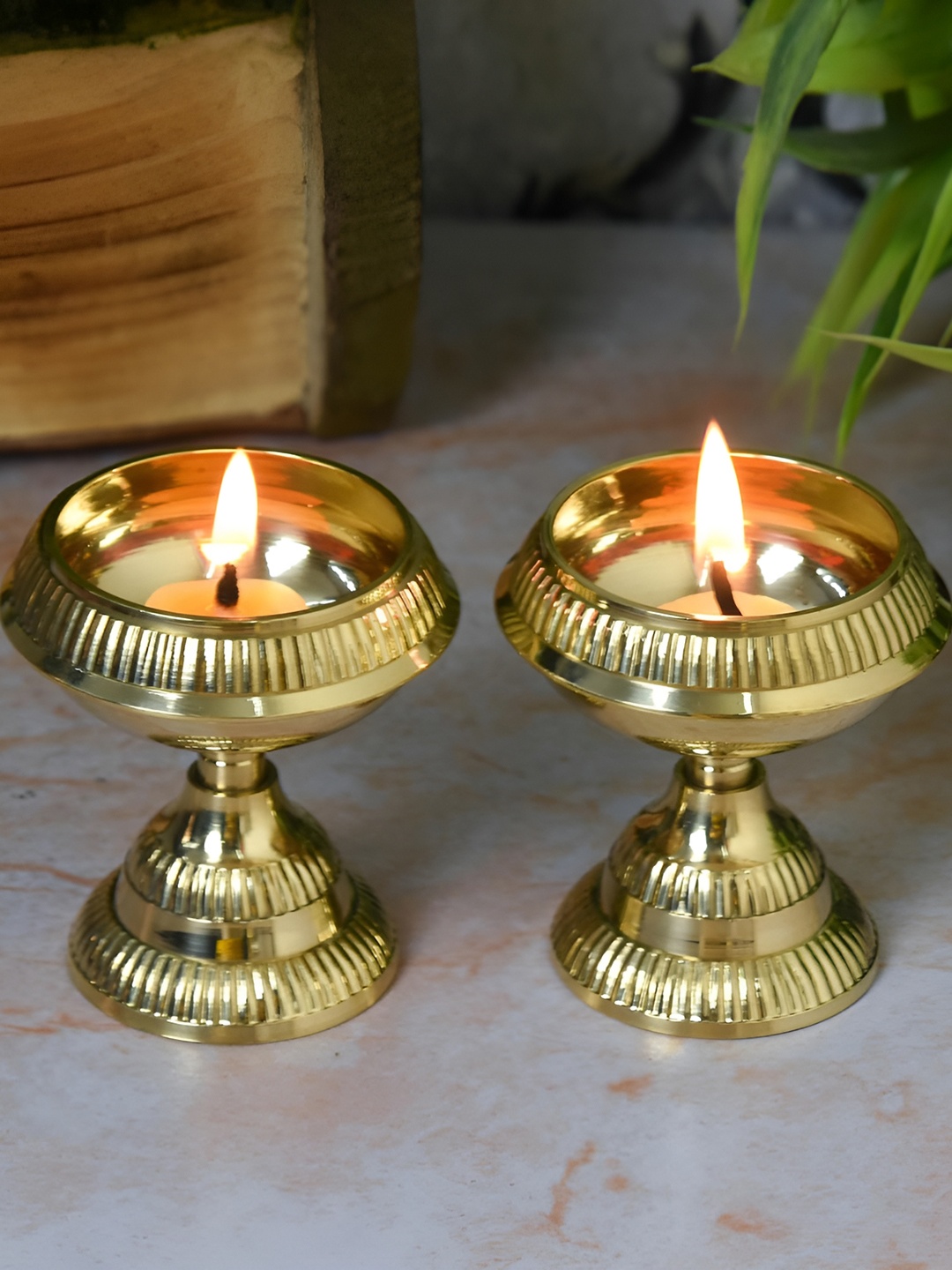 

Bhimonee Decor Gold Toned 2 Pieces Pure Brass Kuber Akhand Nanda Stand Diyas