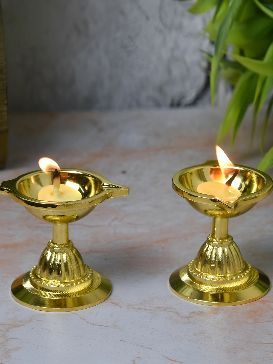 

Bhimonee Decor Gold Toned 2 Pieces Pure Brass Kuber Diya Stand
