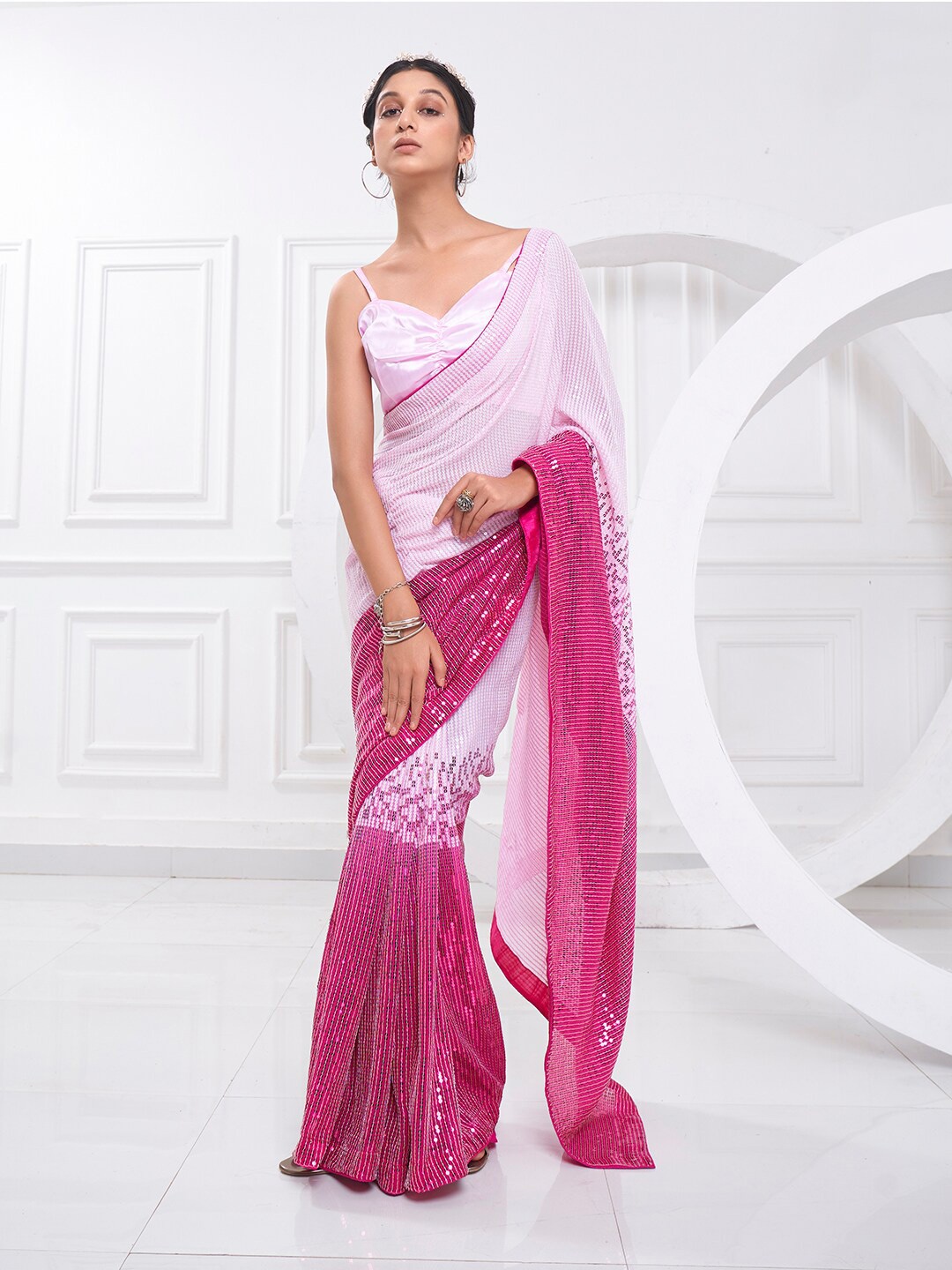 

Mitera Pink Embellished Sequinned Pure Georgette Designer Saree