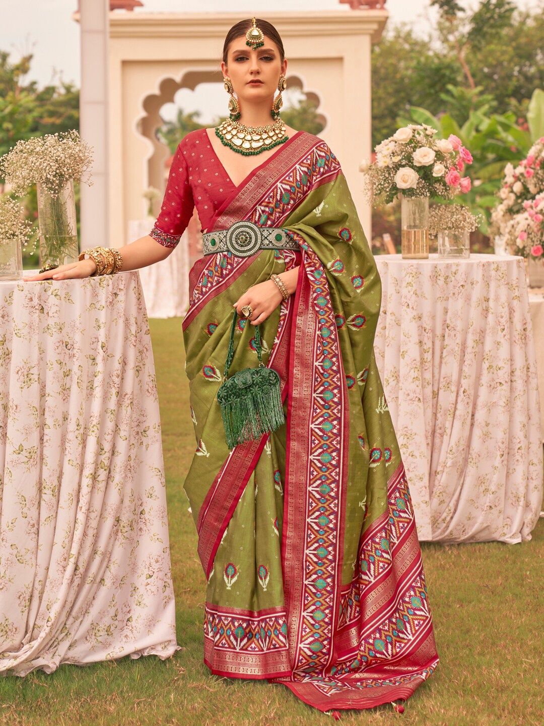 

Anouk Ethnic Motifs Printed Patola Saree, Olive