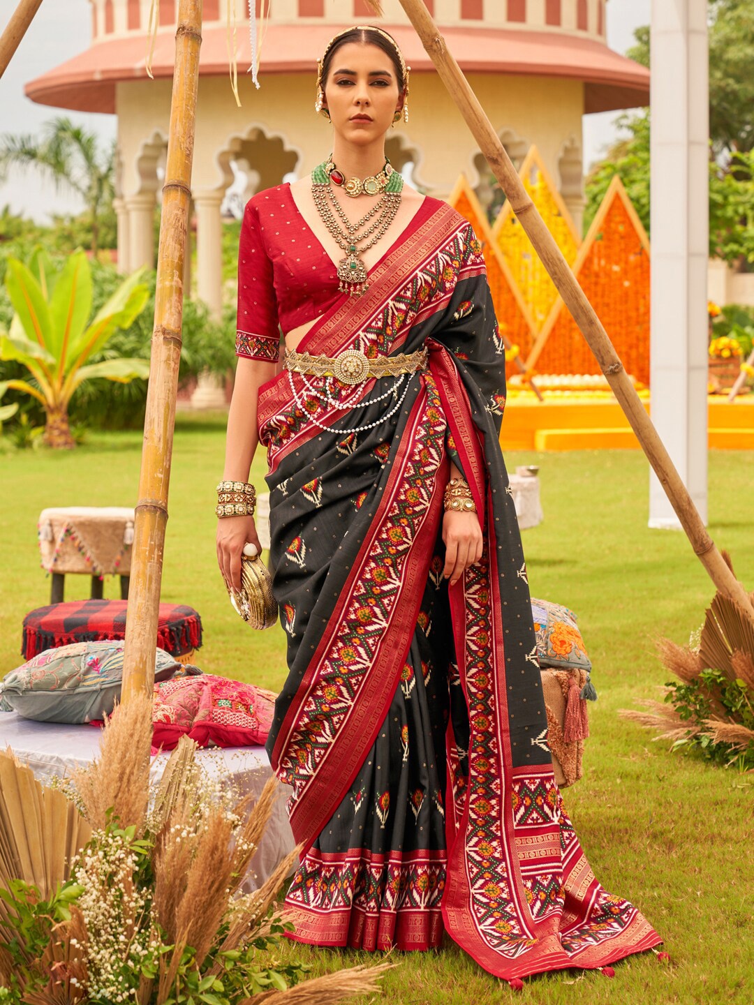 

Anouk Black & Red Ethnic Motifs Woven Designed Zari Patola Saree