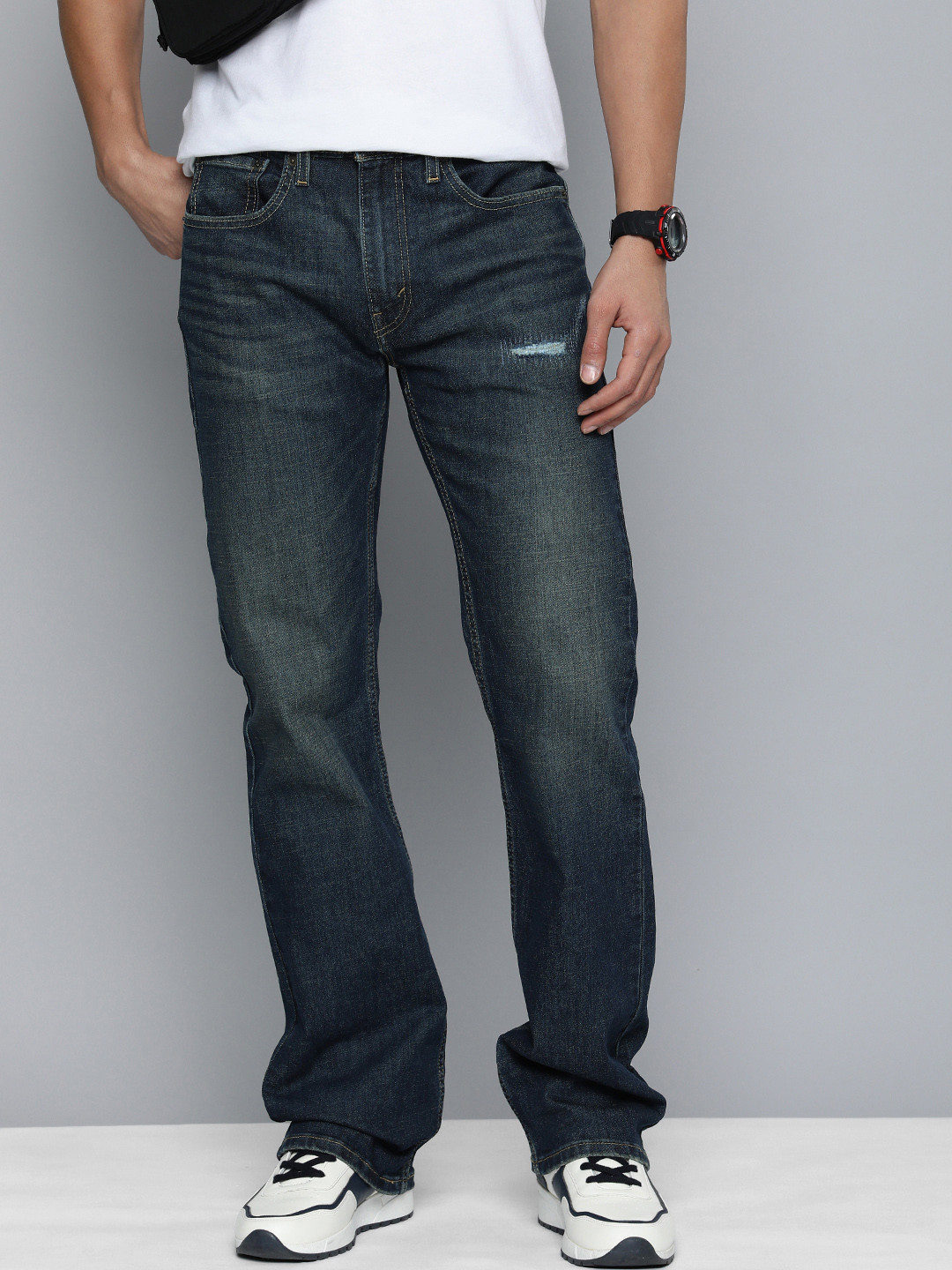

Levis Men 527 Bootcut Light Low Distress Fade Stretchable Jeans, Blue