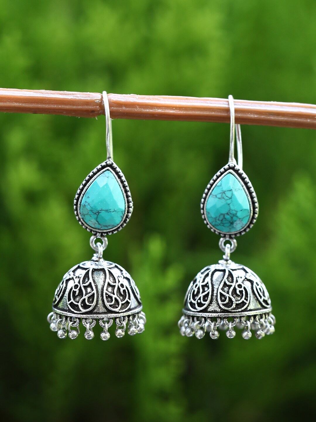 

Anouk Silver-Toned Silver-Plated Dome Shaped Jhumkas