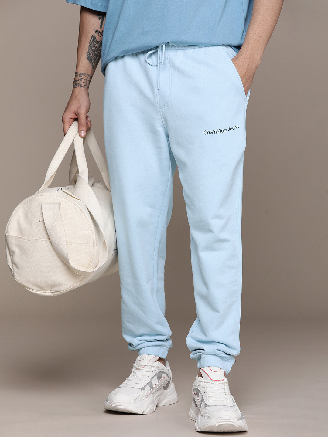

Calvin Klein Jeans Men Pure Cotton Mid-Rise Joggers, Blue