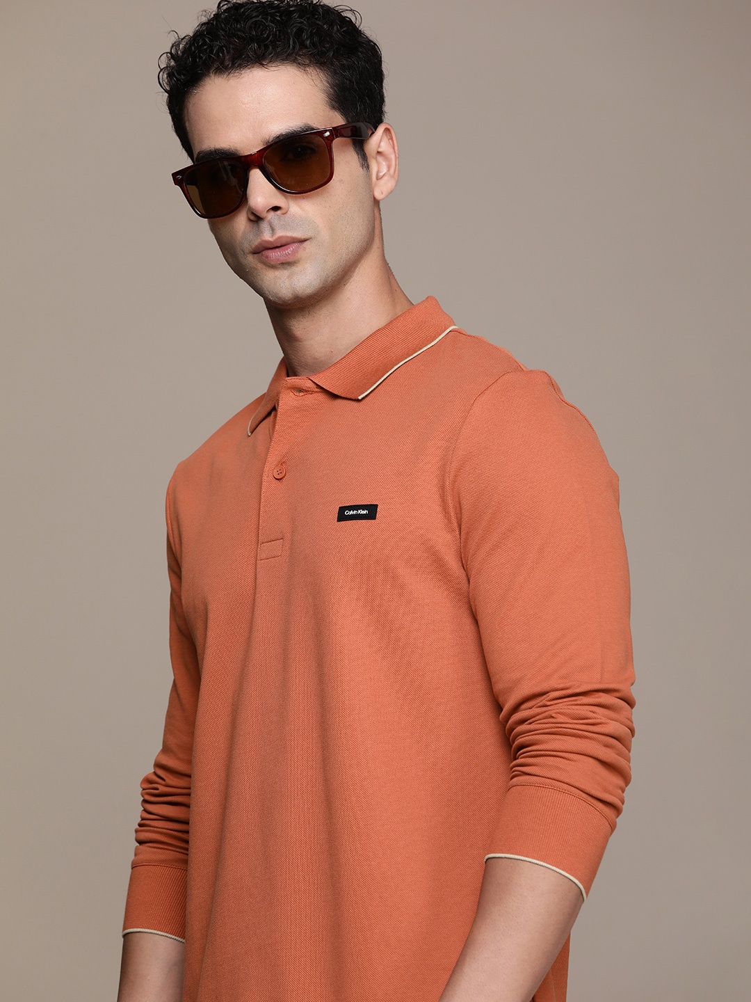 

Calvin Klein Jeans Solid Polo Collar Slim Fit T-shirt, Rust