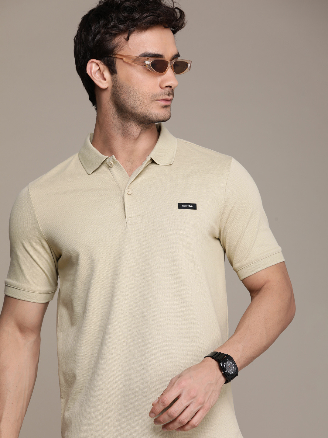 

Calvin Klein Jeans Solid Polo Collar Slim Fit T-shirt, Beige